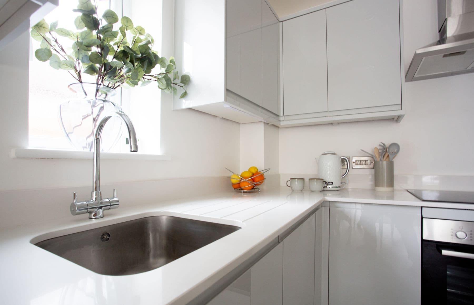 Bright modern kitchen photographed with clean lines and natural light